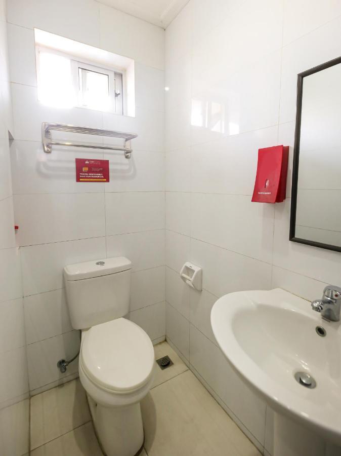 Oyo 842 City Smiles Apartelle San Juan  Bagian luar foto