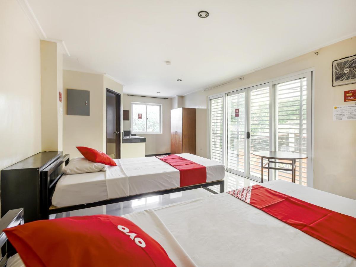 Oyo 842 City Smiles Apartelle San Juan  Bagian luar foto