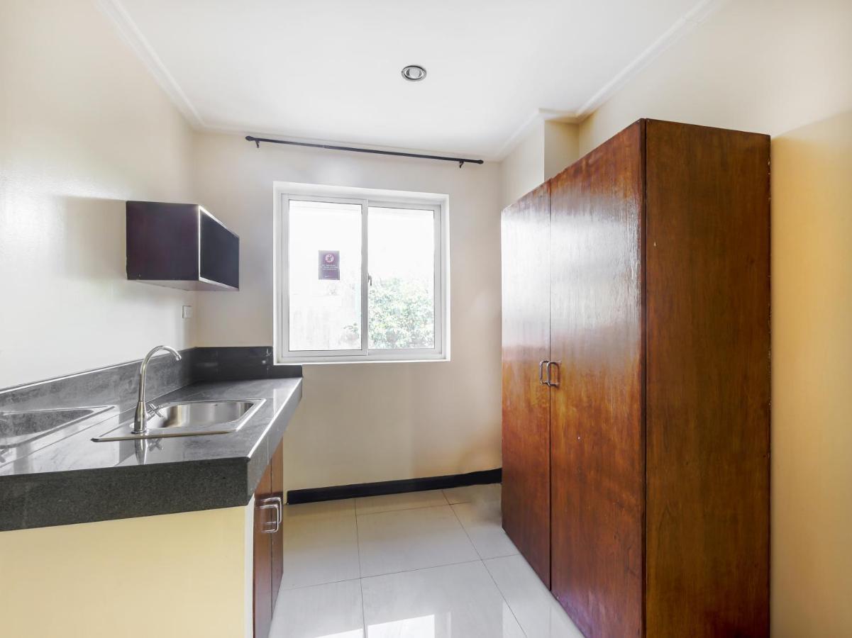 Oyo 842 City Smiles Apartelle San Juan  Bagian luar foto